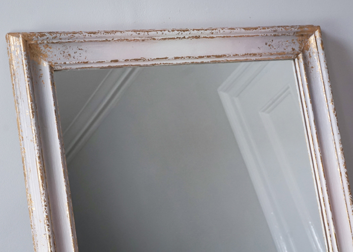Close up of the pink, lavender and white ombre full length mirror with gold leaf details