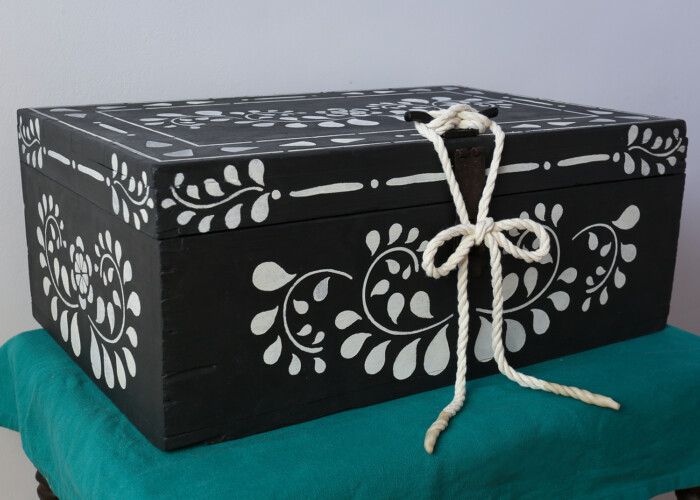 Hand painted storage wooden box in black and white with rope fastening. Painted using Annie Sloan paint. Upcycled using stencils.