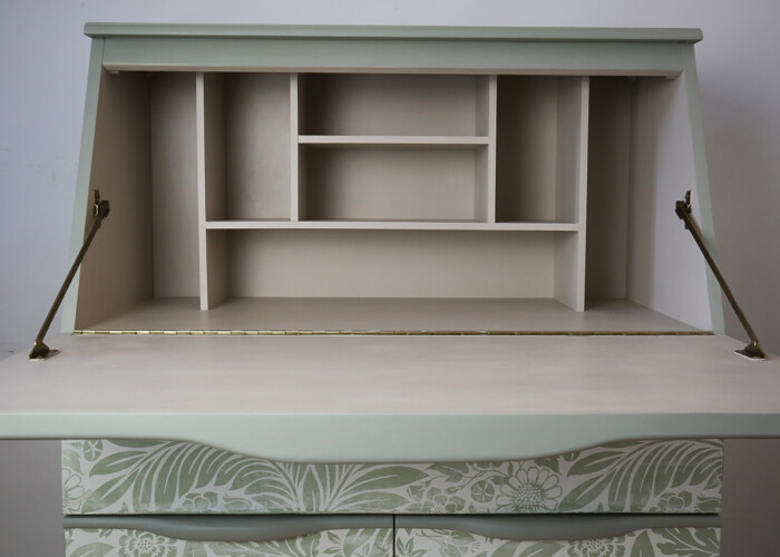 Close up of open bureau with cream shelfing and desk top painted in Fusion Mineral Paint's Cathedral Taupe