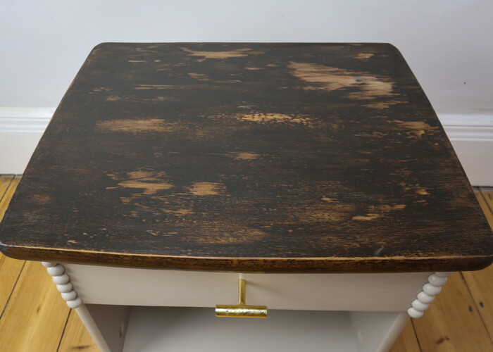 Close up of the stained and wax wood top