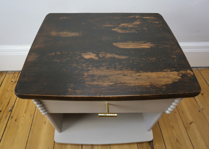 Close up of the stained and wax wood top